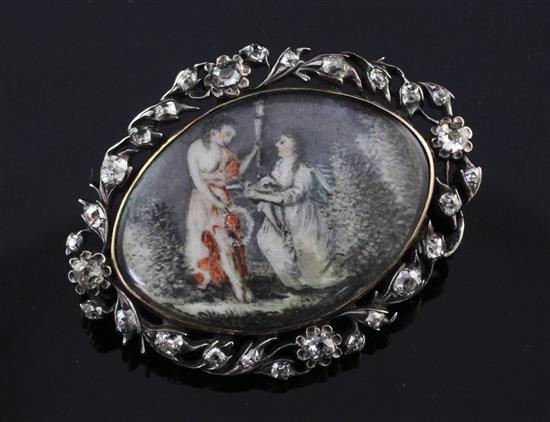 A Georgian silver and gold, diamond set brooch with inset painted ivory panel, 1.75in.